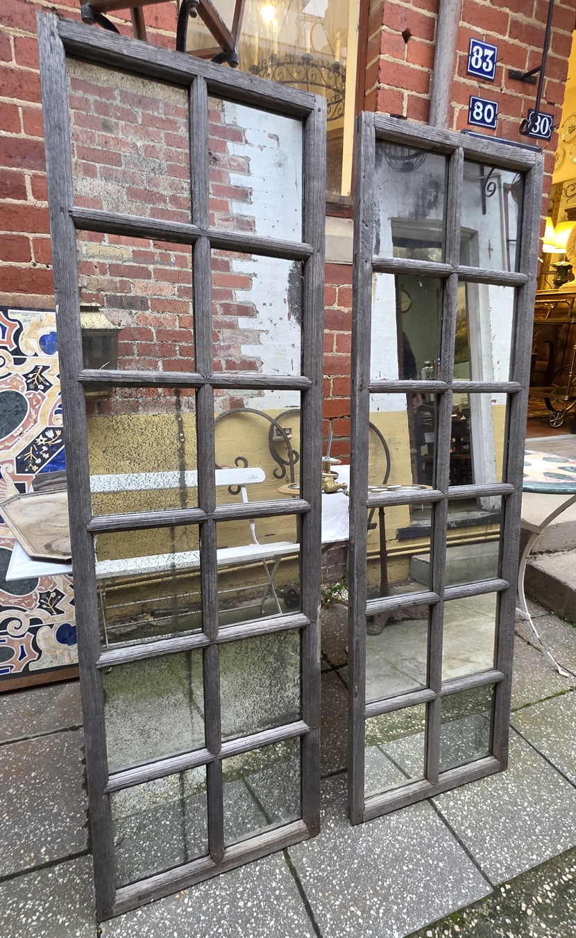 A pair of Chateau Window Mirrors